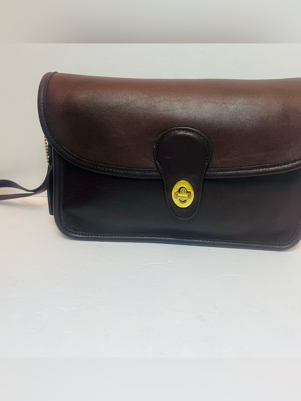 Authentic vintage Coach Turnlock Clutch (Style #9971) originally Men’s clutch.